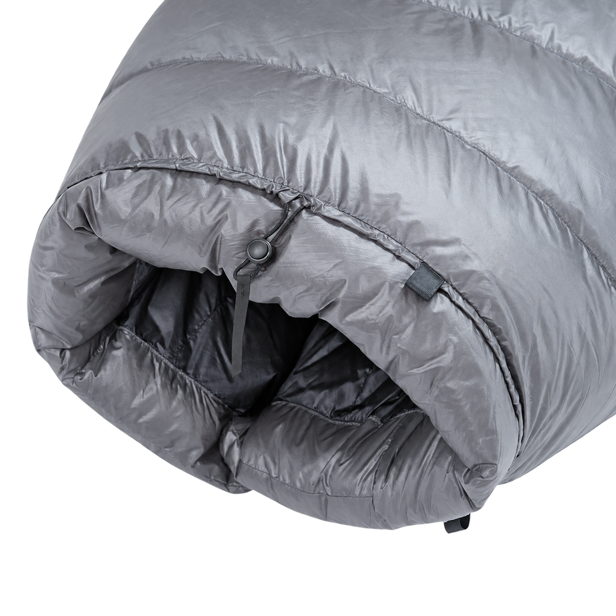 Detailed view of the cinched top neck collar with adjustable cord lock and insulated draft baffle on the red Outdoor Vitals StormLoft Down TopQuilt.
