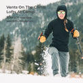 A woman skiing in the snow wearing a black hooded jacket, gray pants, and orange gloves, with text overlay reading 'Vents On The Climb Lofts At Camp' and '3DeFX™ reactive warmth insulation'.