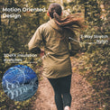 A woman running on a forest path wearing an olive green hooded jacket, with callout text highlighting motion-optimized design, 2-way stretch nylon, and 3DeFX insulation stretches. A circular inset shows the blue and gray elastic fabric detail.